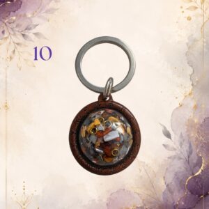 Wonky Wuns handmade orgonite keyring with a wooden surround, piece number 10, set with mixed crystal chips