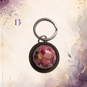 Wonky Wuns handmade orgonite keyring with a wooden surround, piece number 13, set with mixed crystal chips