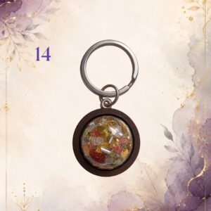 Wonky Wuns handmade orgonite keyring with a wooden surround, piece number 14, set with mixed crystal chips