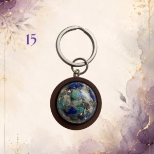 Wonky Wuns handmade orgonite keyring with a wooden surround, piece number 15, set with mixed crystal chips