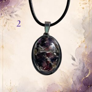 Wonky Wuns handmade orgonite pendant on a black cord, piece number 2, set with mixed crystal chips
