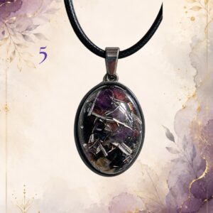 Wonky Wuns handmade orgonite pendant on a black cord, piece number 5, set with mixed crystal chips