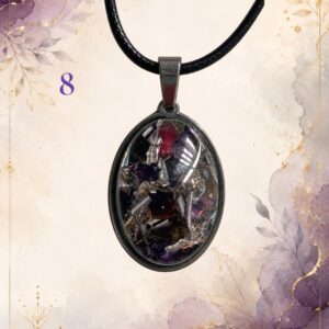 Wonky Wuns handmade orgonite pendant on a black cord, piece number 8, set with mixed crystal chips